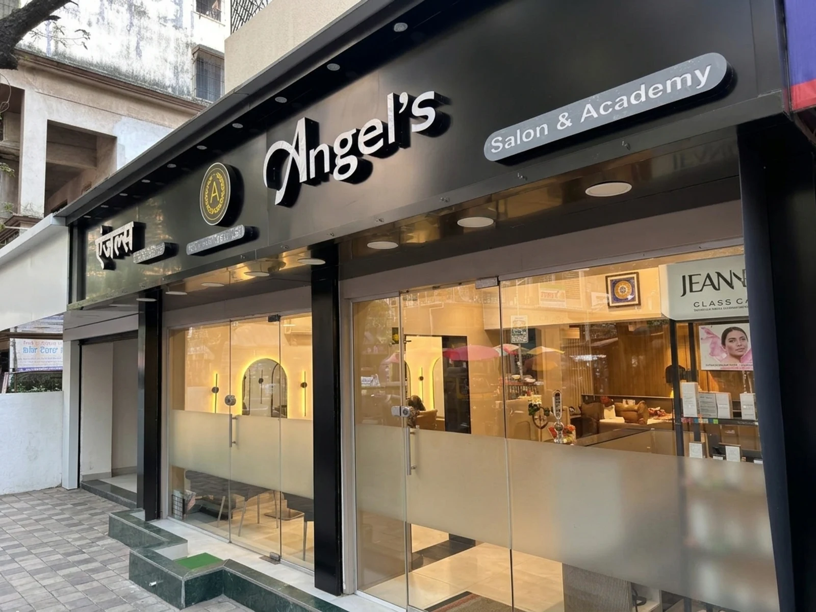 Angels Salon & Academy 3D gold illuminated academy signage and boutique exterior